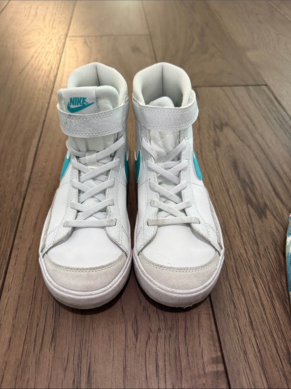 Nike White High-Top Sneakers with Teal Accent